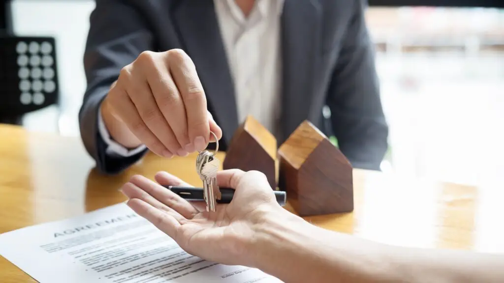 Joseph Raetzer of Raetzer PLLC, a New York-based law firm, closing a real estate deal with clients, specializing in acquisitions, leases, and real estate finance.